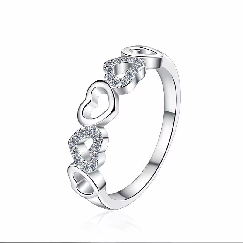 Delicate Heart-Designed Sterling Silver Ring with Moissanite Accents