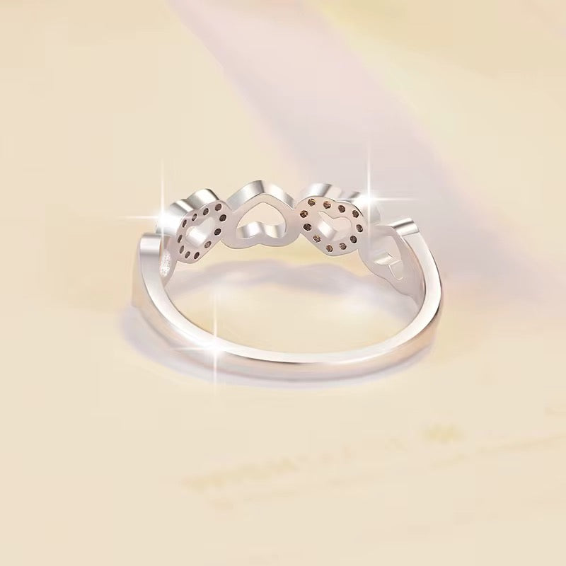 Delicate Heart-Designed Sterling Silver Ring with Moissanite Accents